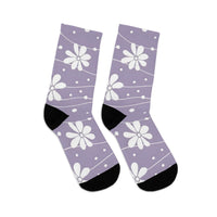 Purple floral Printify recycled poly socks with white flowers and black heels and toes