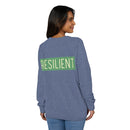 Woman wearing a blue Printify eco-friendly crewneck sweatshirt with resilient text on the back