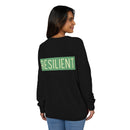 Printify eco-friendly crewneck sweatshirt in black with green RESILIENT text on back worn by woman