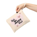 Printify eco-friendly zipper pouch with Self Love Club design held by hand with strap
