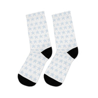 White socks with light blue snowflake pattern and black heels and toes sustainable recycled poly socks