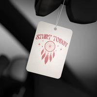 Eco-friendly car air freshener hanging with Start Today text and dreamcatcher design