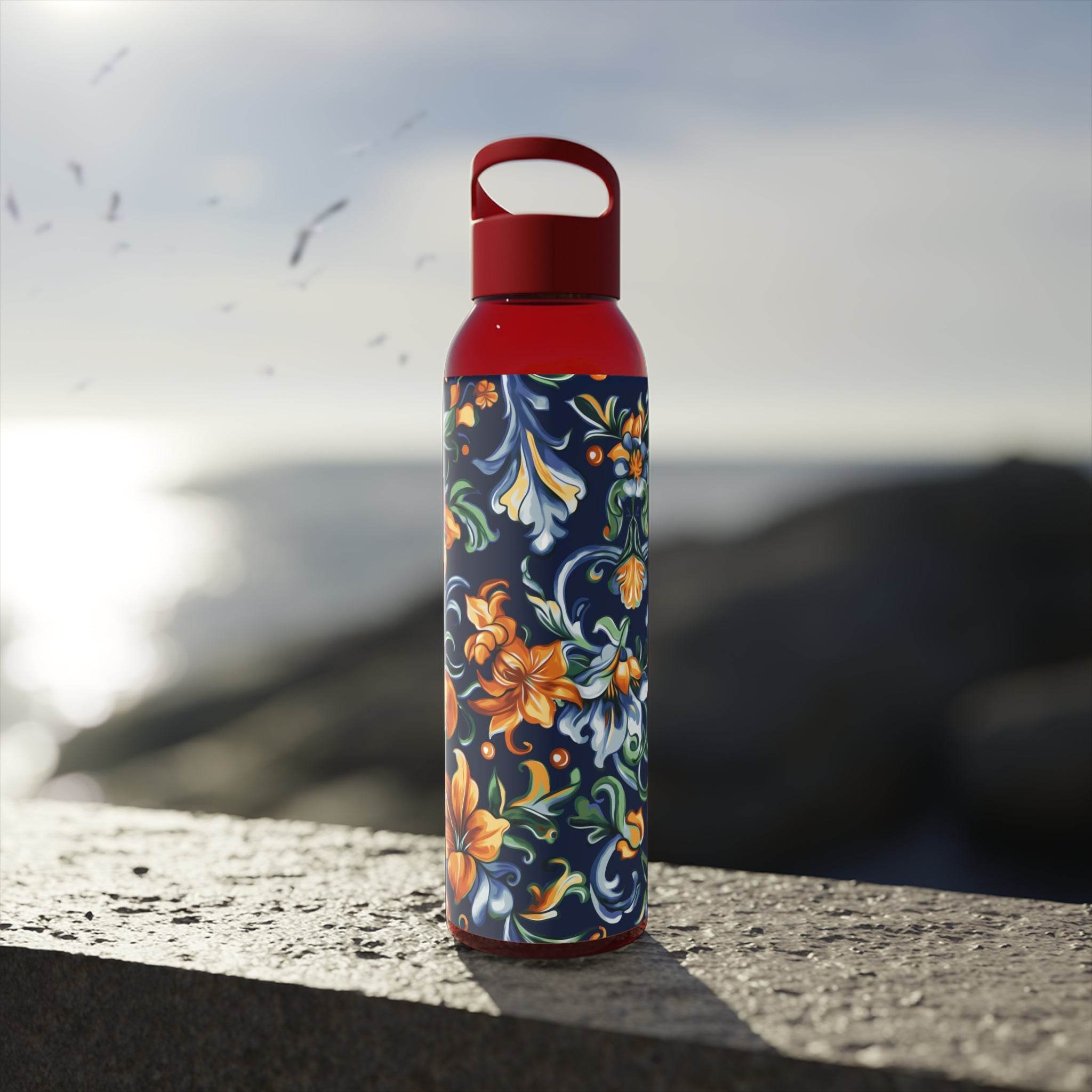 Printify stylish eco water bottle with red lid and floral design on stone surface outdoors