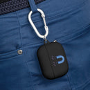 Black sustainable AirPods Pro cover with blue magnet design hanging on carabiner clipped to blue pants
