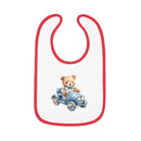 Printify sustainable baby bib with red trim featuring a teddy bear driving a blue toy car design