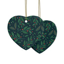 Heart-shaped sustainable ceramic holiday decorations with green holly and red berries print