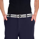 Person wearing a sustainable direction belt with black arrow design and silver buckle on navy pants