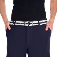Person wearing a sustainable direction belt with black arrow design and silver buckle on navy pants