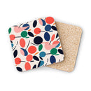 Colorful patterned sustainable drink coasters made by Printify with cork backing for kitchen use