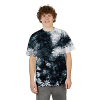 Printify sustainable fashion tie-dye shirt worn by a smiling young man with curly hair