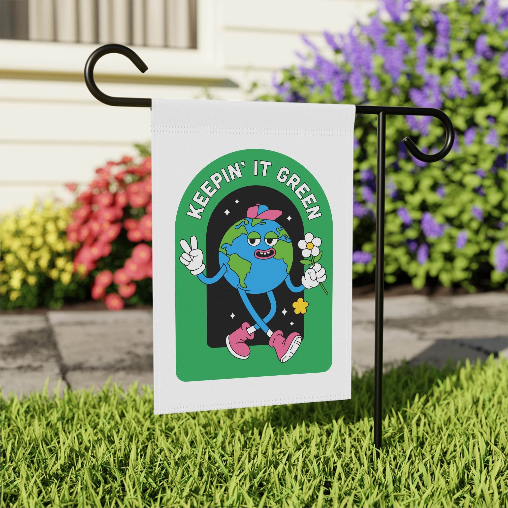 Printify sustainable house flags featuring a cartoon Earth with peace sign and flower in a green Keepin It Green design