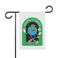 Printify sustainable house flags with cartoon Earth holding a flower and text Keepin’ It Green