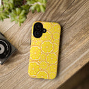 Printify sustainable lemon tough cases phone case with bright yellow lemon slice design on wood background