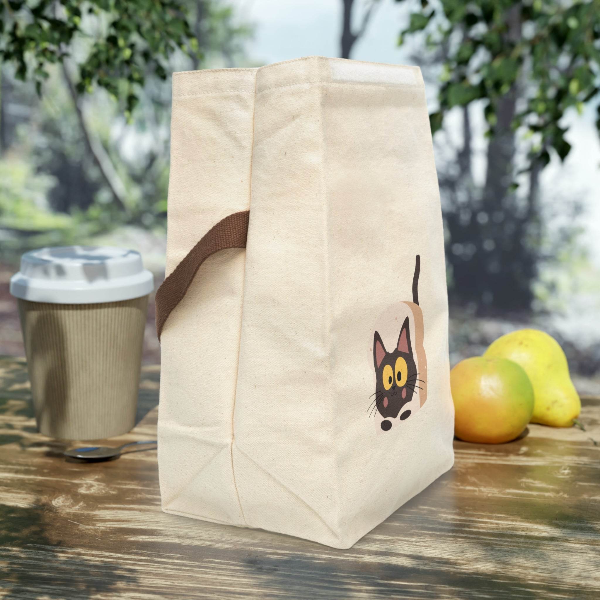 Printify sustainable lunch bag with strap featuring a cute black cat design on beige fabric
