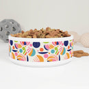 Printify sustainable pet bowl fancy design with colorful abstract pattern filled with dog treats
