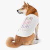 Shiba Inu wearing a sustainable pet tank top with a fun text design for stylish pets