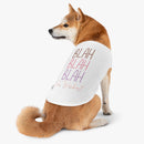 Shiba Inu wearing a sustainable pet tank top with a fun text design for stylish pets