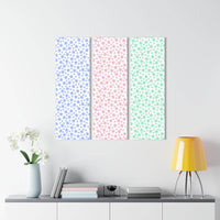 Printify sustainable triptych prints with pastel star patterns displayed above modern shelf with books lamp and flowers