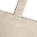 Close-up of natural fabric teacher canvas tote bag strap and stitching detail from Printify
