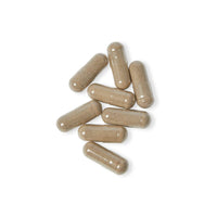 Close-up of Thalassa Sea Moss Capsules supplement by Printify on white background