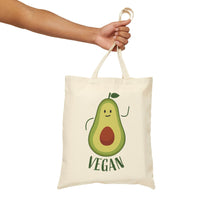 Printify eco-friendly cotton tote bag with cute vegan avocado design held by hand