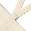 Close-up of eco-friendly cotton tote bag strap and corner showing natural fabric texture