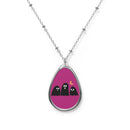 Printify eco-friendly ghost necklace with three black ghost figures on a purple background pendant