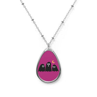 Printify eco-friendly ghost necklace with three black ghost figures on a purple background pendant