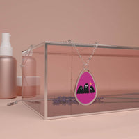 Printify eco-friendly ghost necklace with silver chain and purple pendant featuring three black ghosts and a crescent moon