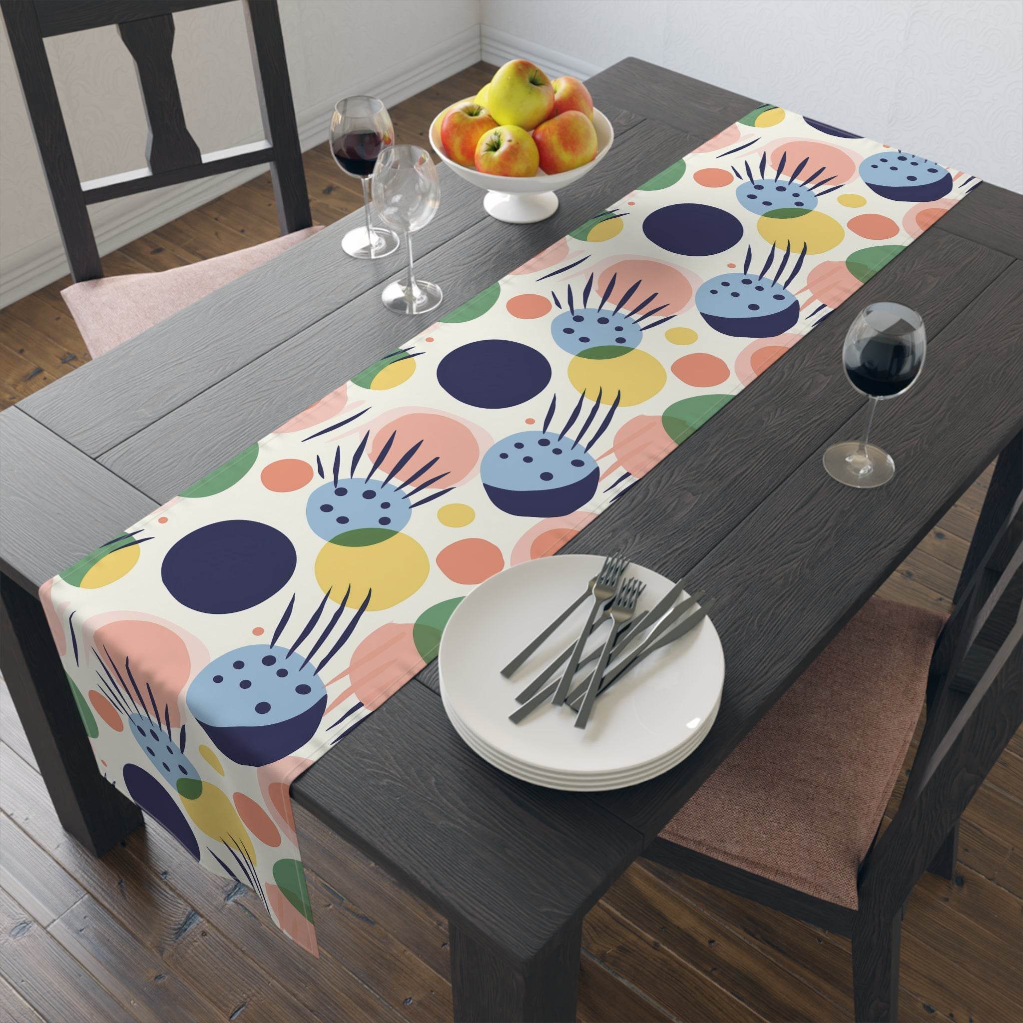 Printify eco-friendly table runner with colorful abstract pattern on dark wooden dining table