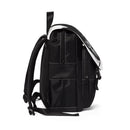 Side view of black Nine Lives cat design backpack with padded straps and multiple zippered pockets